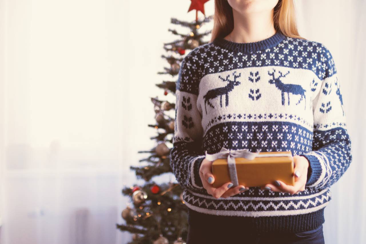 Woman wearing Christmas jumper